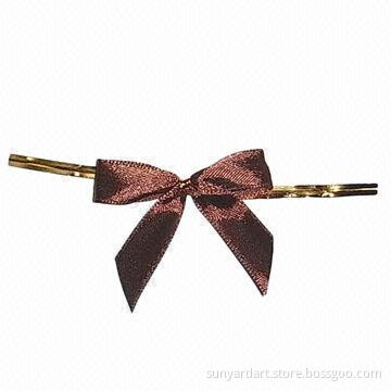 Twist tie bow, comes in brown color